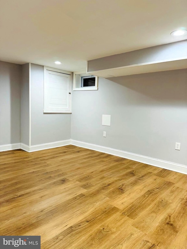 basement with light wood-type flooring