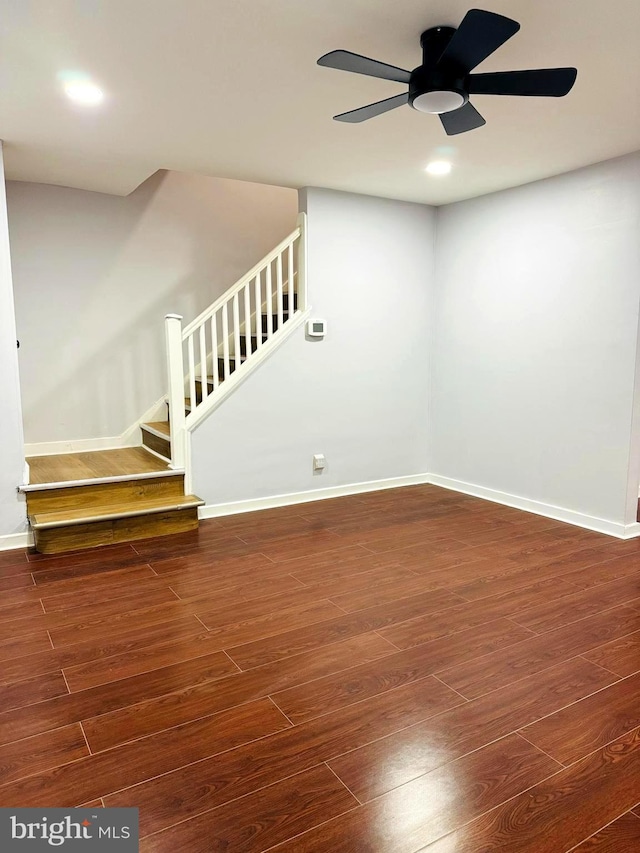 interior space featuring dark hardwood / wood-style floors and ceiling fan