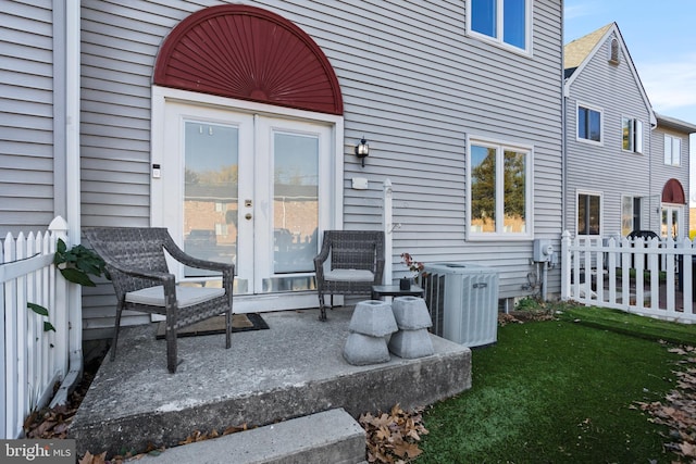 view of patio / terrace featuring french doors and central AC