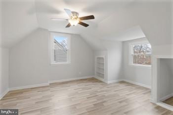 bonus room featuring ceiling fan, vaulted ceiling, and light hardwood / wood-style flooring