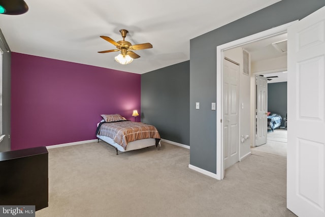 carpeted bedroom with ceiling fan