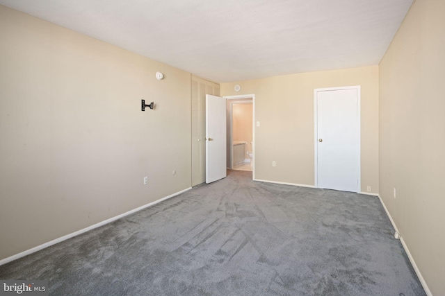 unfurnished bedroom with carpet floors