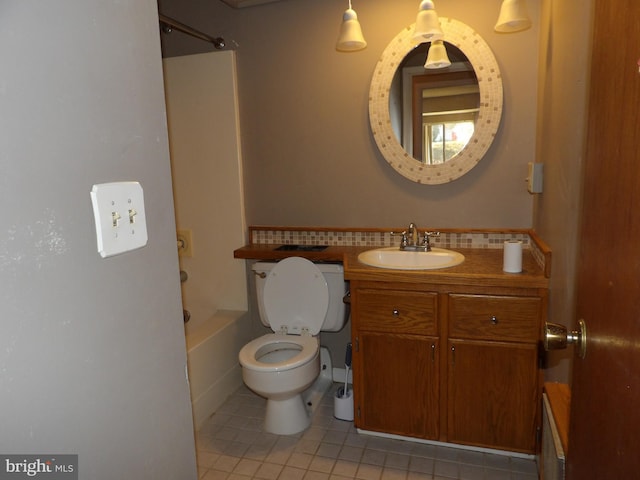 full bathroom with tile patterned flooring, vanity, bathtub / shower combination, and toilet