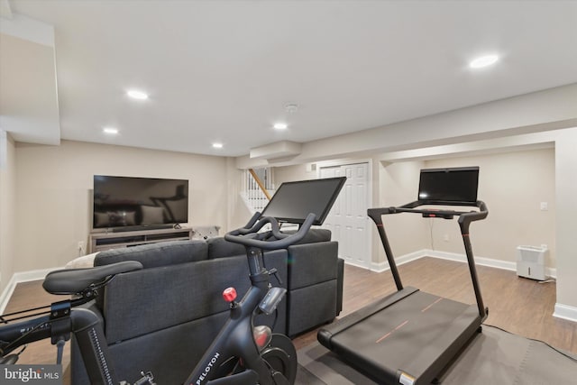 workout area featuring wood-type flooring