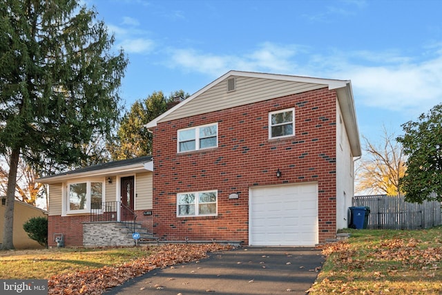 split level home featuring a garage