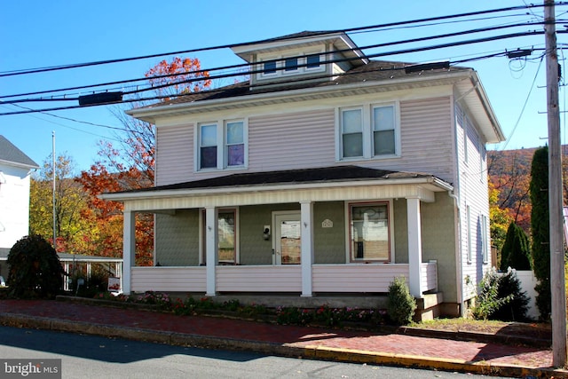 view of front of home featuring covered porch