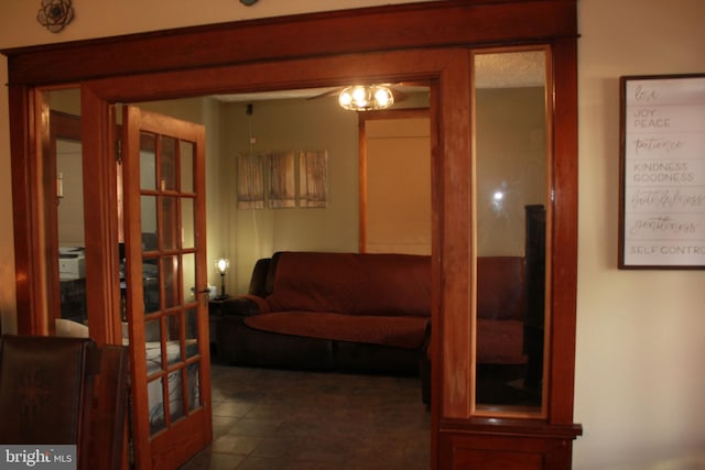 corridor featuring dark tile patterned floors