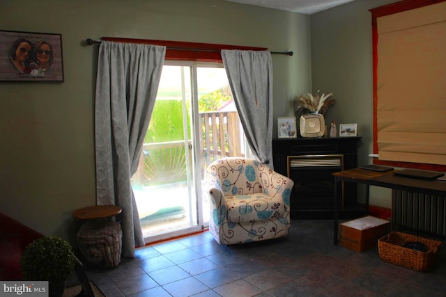 sitting room featuring tile patterned floors