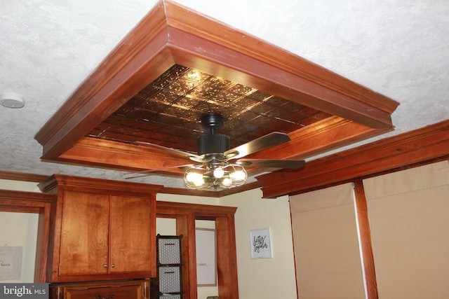 details with ceiling fan and crown molding