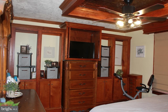 bedroom with ceiling fan and ornamental molding