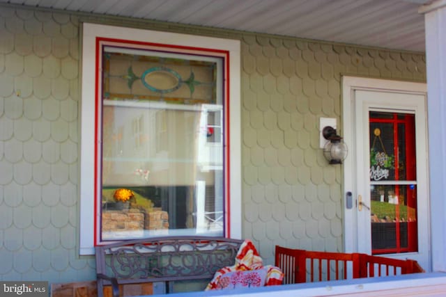 property entrance with a porch