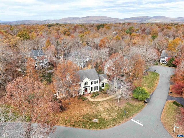 1790 Shelbourn Ln, Keswick, VA 22947 - aerial view of property and surrounding area with a heavily wooded area and a mountain backdrop