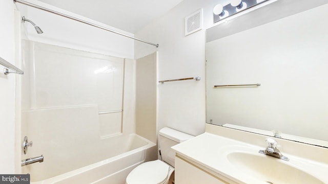 full bathroom with bathtub / shower combination, vanity, and toilet