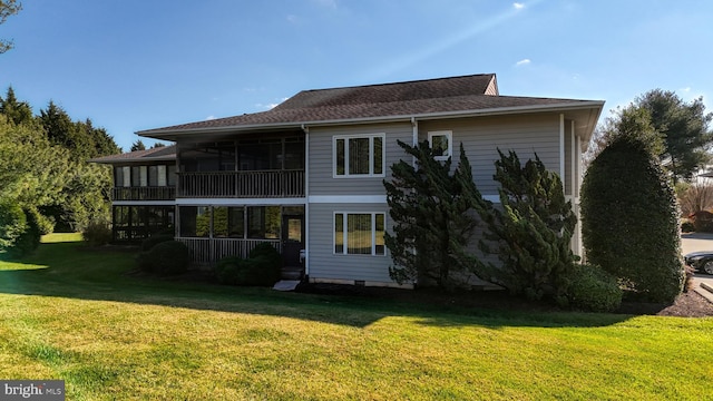 33945 Middleton Cir Unit 1, Lewes, DE 19958 - back of house with a lawn and a sunroom