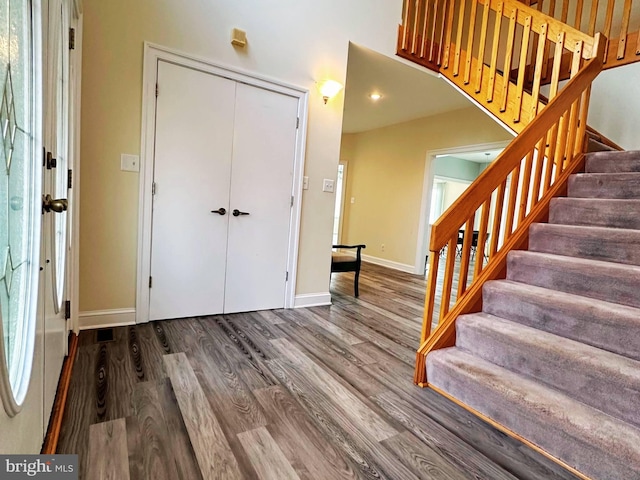 entryway with wood-type flooring