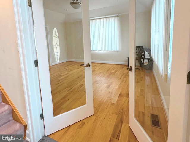 interior space with hardwood / wood-style flooring