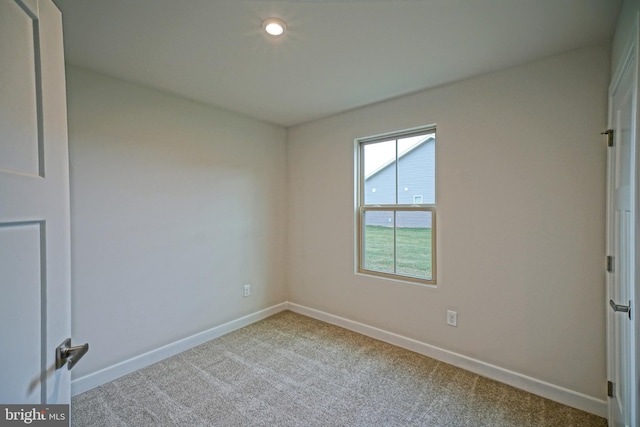 view of carpeted spare room