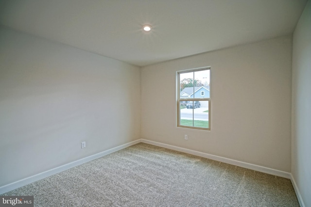 empty room with carpet floors