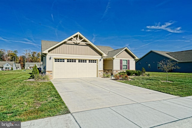 view of front facade with a garage and a front yard