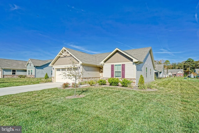 view of front of property featuring a garage and a front lawn