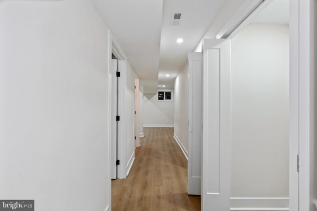 hall featuring light hardwood / wood-style floors