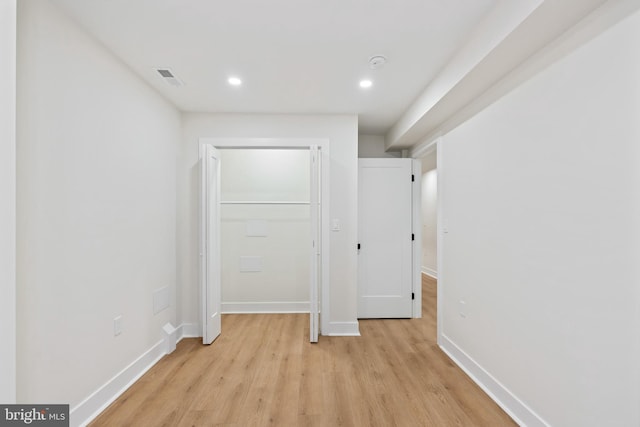 hallway featuring light hardwood / wood-style floors