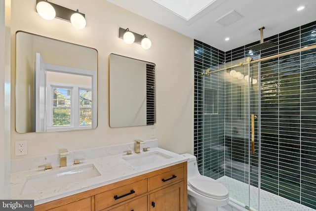 bathroom featuring vanity, toilet, and walk in shower