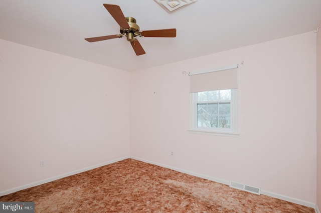 spare room with ceiling fan