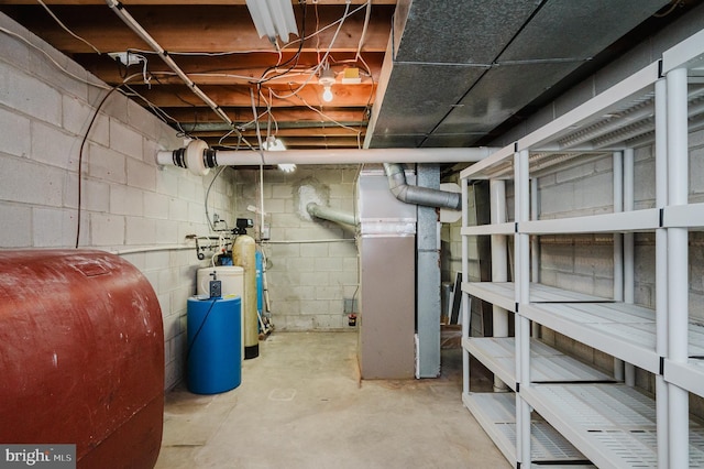 basement featuring heating unit