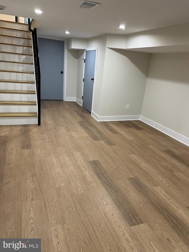 basement with light wood-type flooring