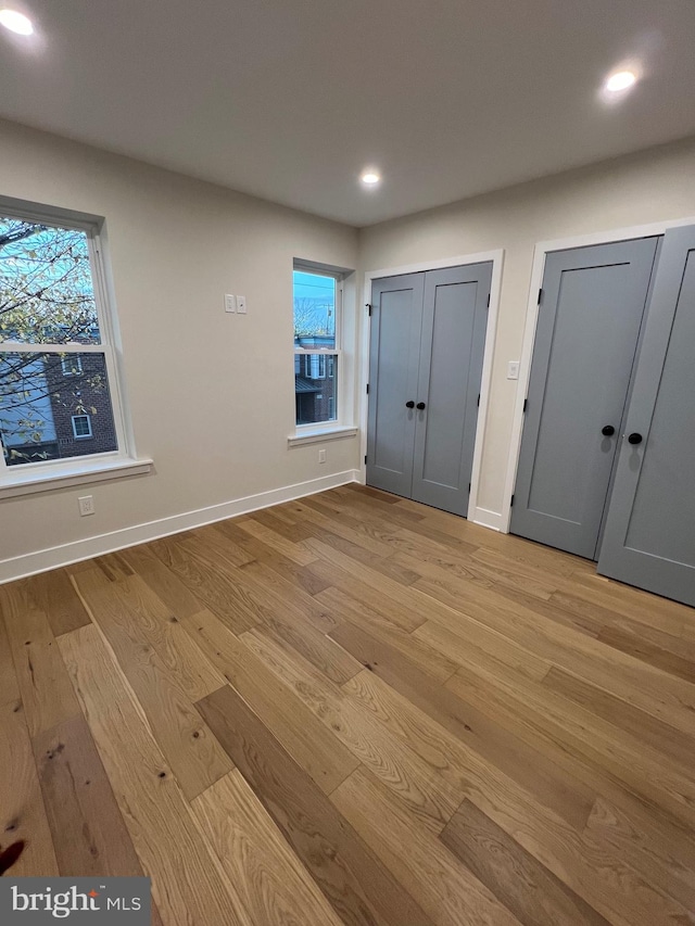 unfurnished bedroom featuring light hardwood / wood-style flooring