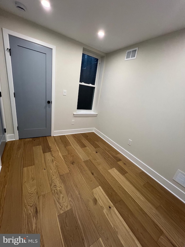 interior space with hardwood / wood-style floors