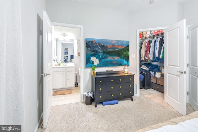 carpeted bedroom with a closet