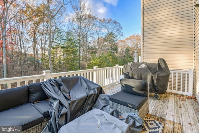 wooden terrace with area for grilling