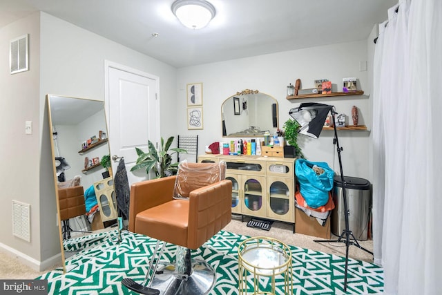 living area featuring light carpet