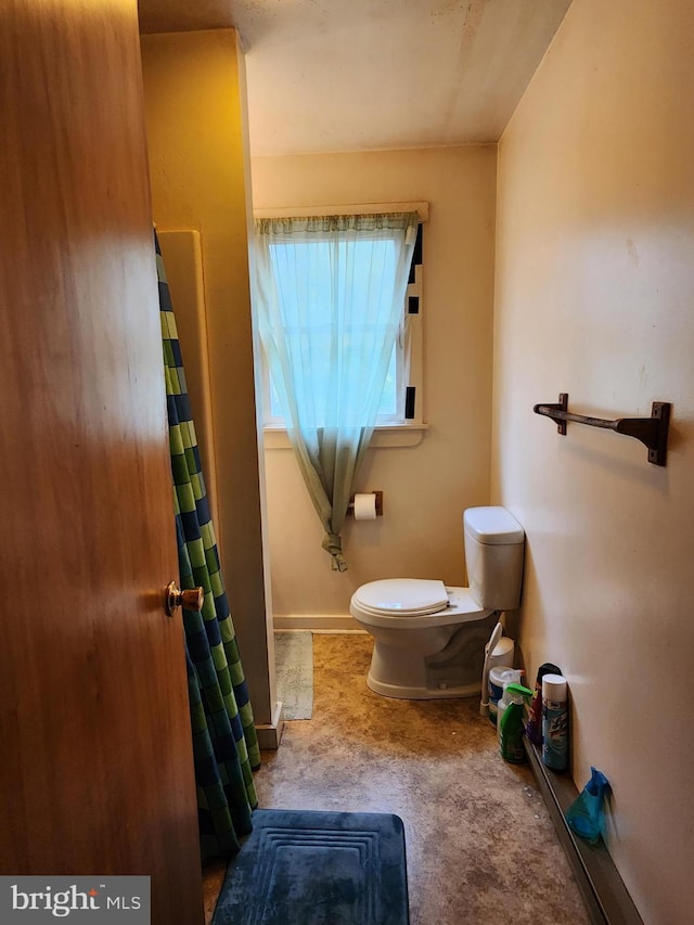 bathroom featuring toilet