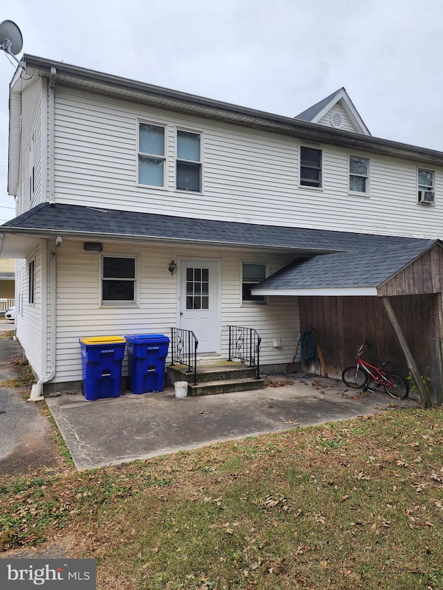 back of house featuring a patio