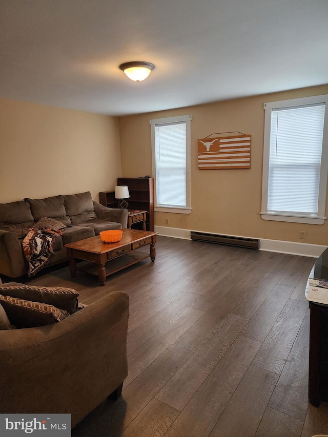 living room with dark hardwood / wood-style flooring and a baseboard radiator