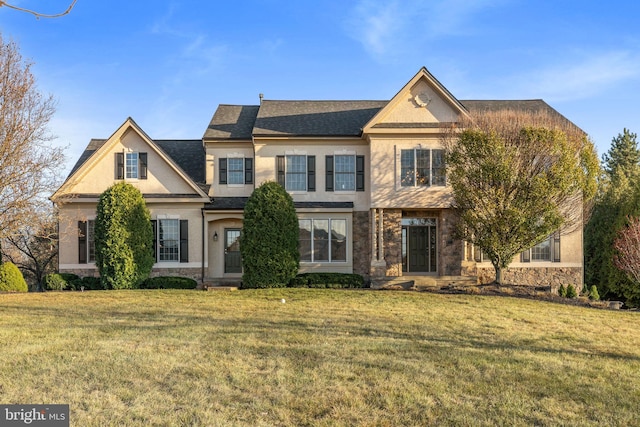 view of front facade with a front lawn