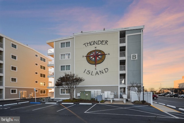 view of outdoor building at dusk