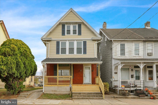 view of front of property featuring covered porch