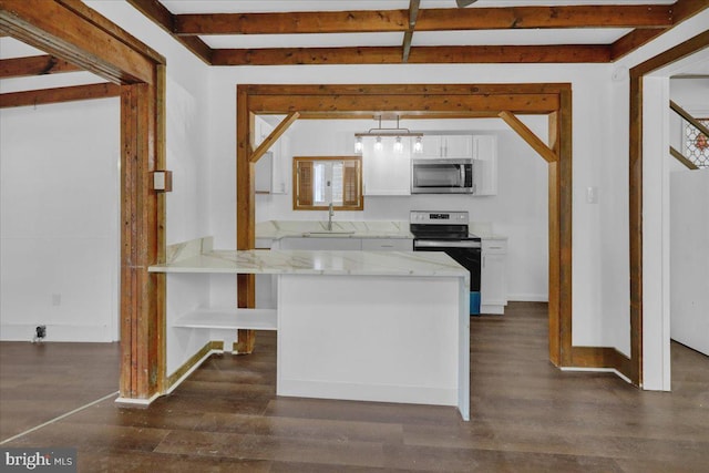 kitchen featuring sink, hanging light fixtures, dark hardwood / wood-style floors, appliances with stainless steel finishes, and white cabinetry