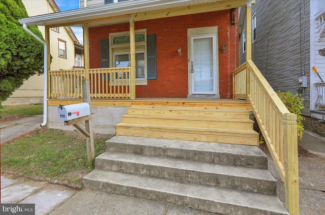 property entrance with a porch