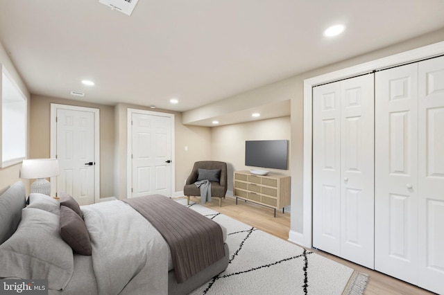 bedroom featuring light hardwood / wood-style floors