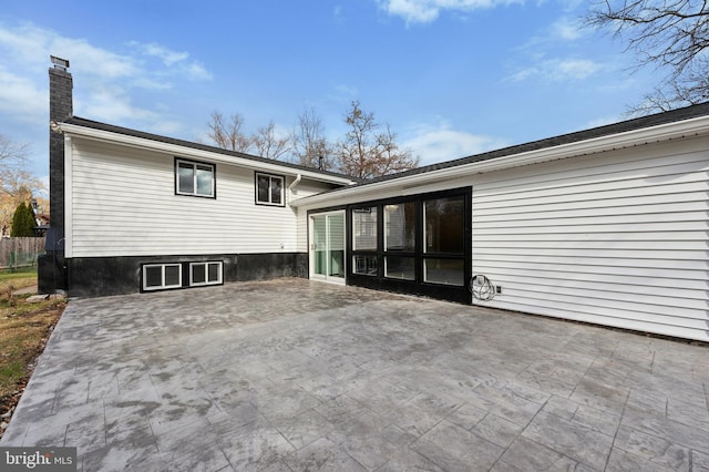 rear view of house with a patio area