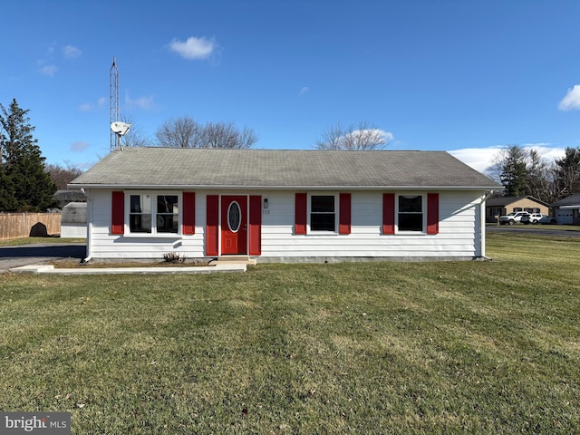 single story home featuring a front yard