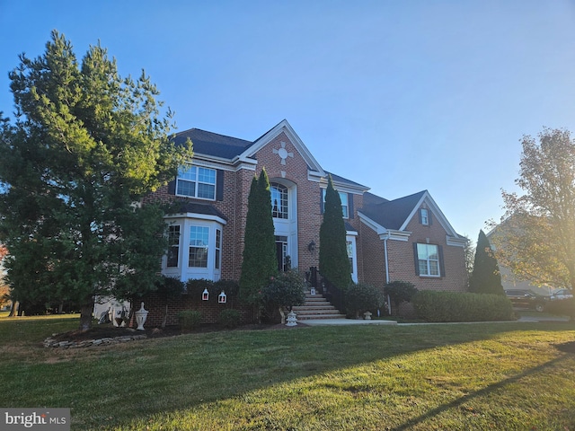 front of property featuring a front yard