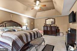 carpeted bedroom with ceiling fan