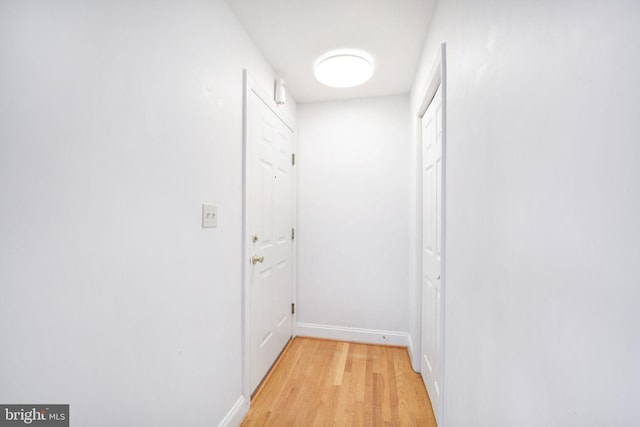 corridor featuring light hardwood / wood-style flooring