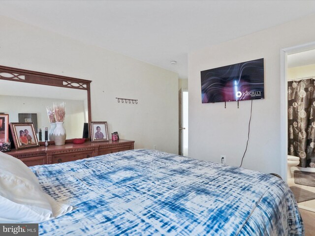 bedroom with ensuite bath